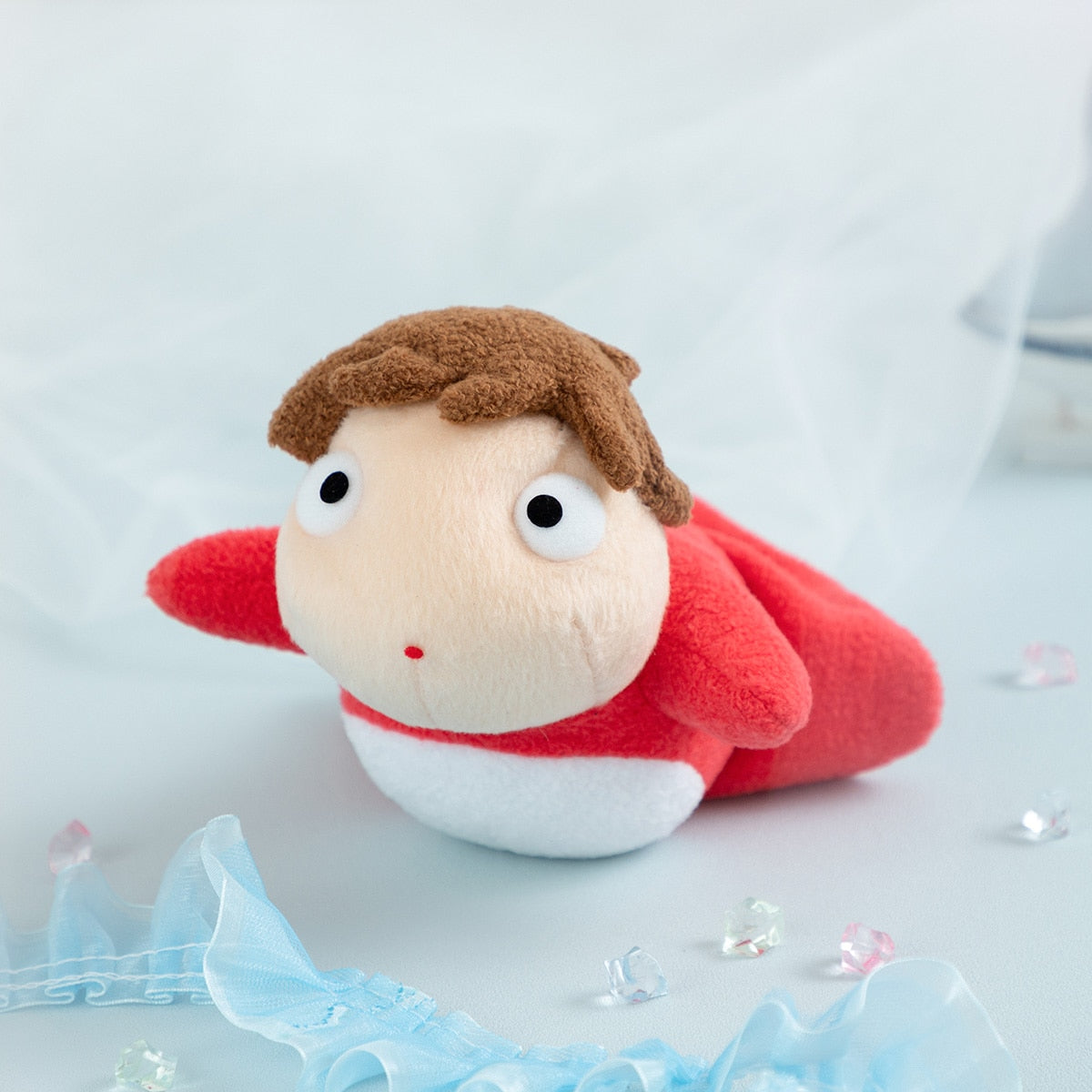 Plyšáček Ponyo z útesu nad mořem